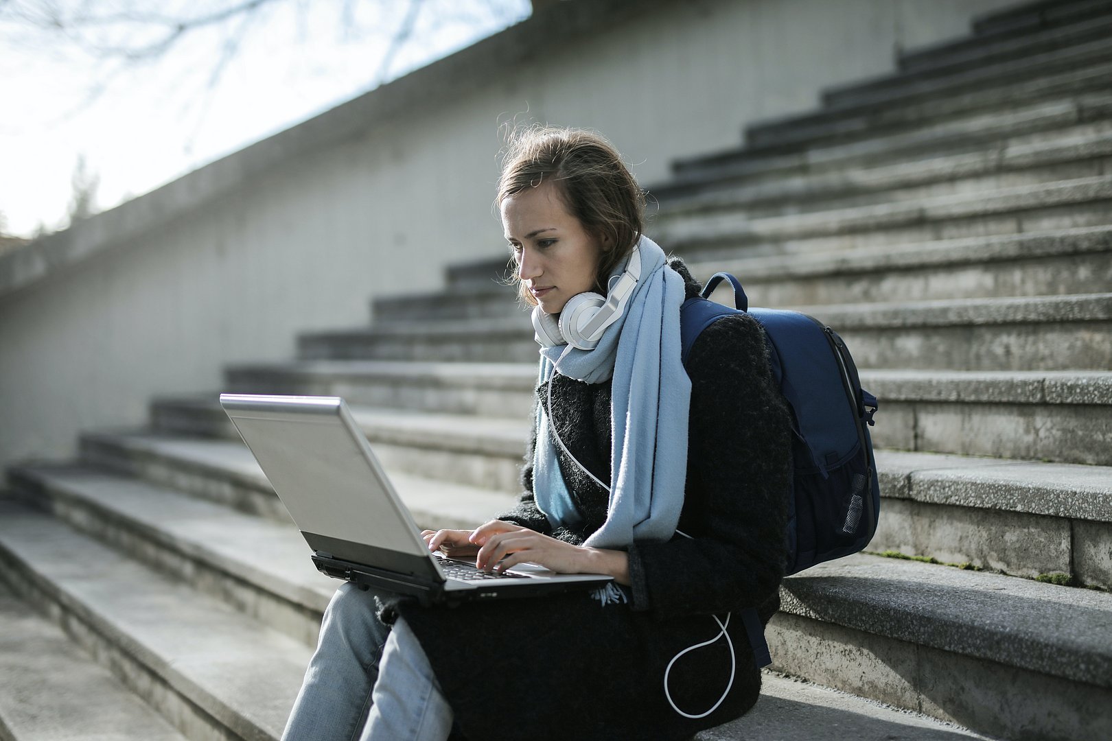 Young woman working on a laptop.